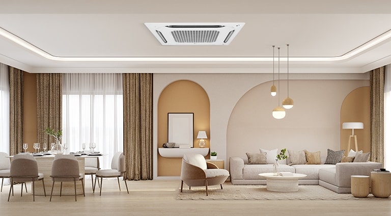 The LG ceiling-mounted cassette disperses cool air in multiple directions, evenly cooling the space. The setting appears to be a modern café or restaurant, with indoor plants and warm lighting.