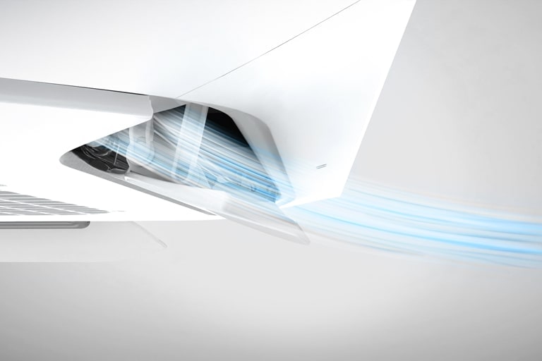 The LG Dual Vane Cassette unit emits a light blue airflow from a single vane, branching out in two distinct directions.