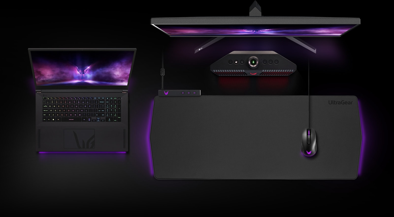 UGP90HB-B-Top view of UltraGear ™ monitor, laptop, speakers, gaming pad, and mouse on black background.