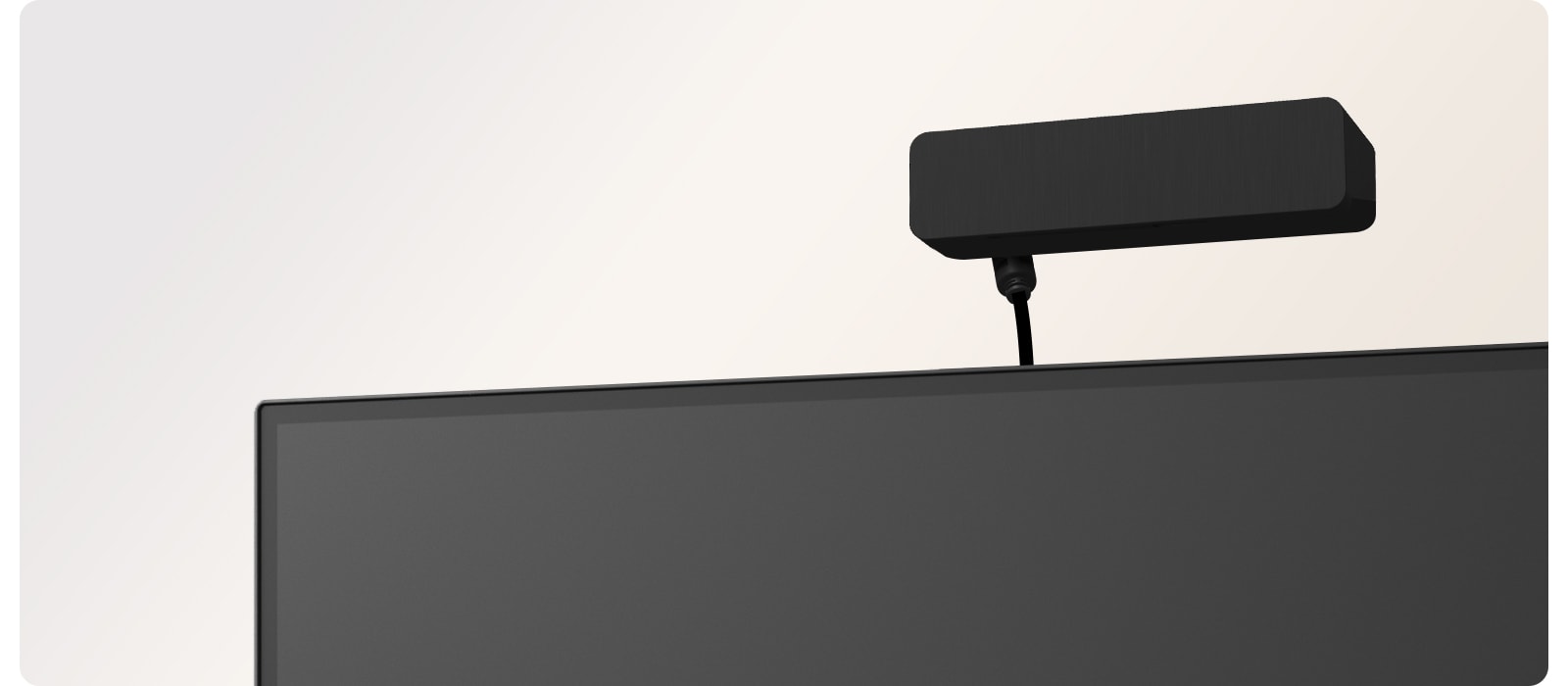 Video showing a detachable calibration sensor attaching to a monitor and lowering automatically to calibrate the screen for accurate medical image display.