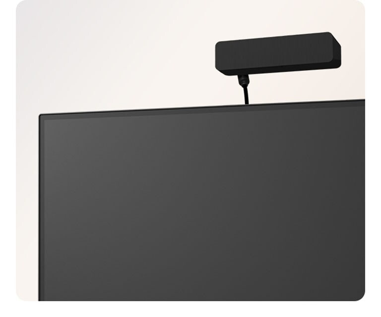 Video showing a detachable calibration sensor attaching to a monitor and lowering automatically to calibrate the screen for accurate medical image display.