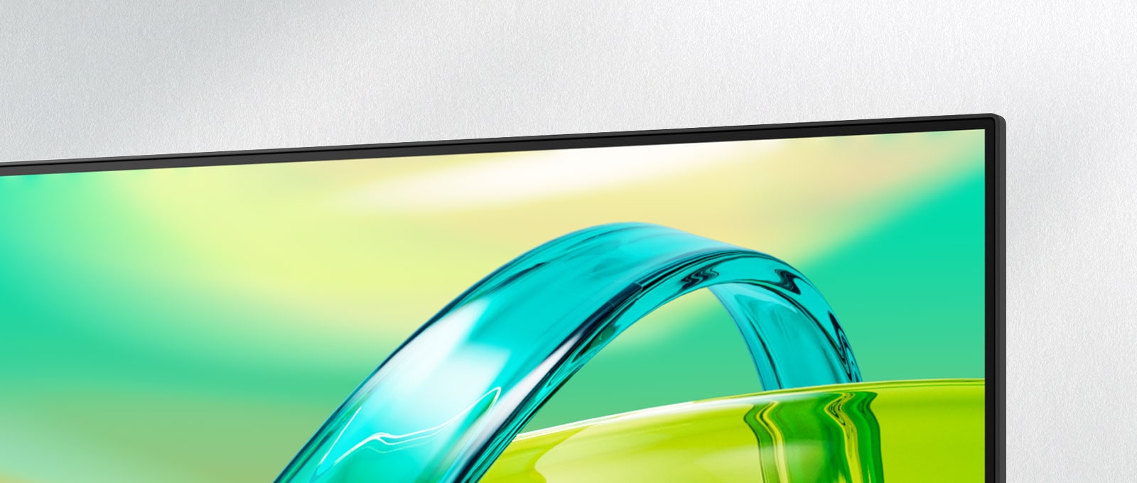 LG FHD monitor displays a green and yellow gradient background with a translucent curved object floating across the screen.