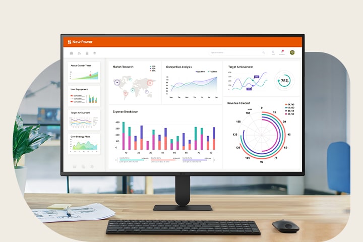 Monitor on a desk displaying a business dashboard with charts and analytics, illustrating productivity and everyday office use.
