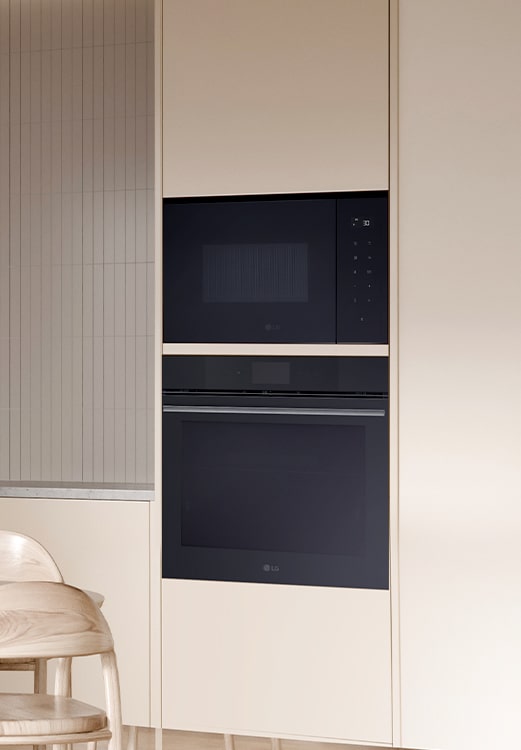The Built- in microwave oven which is installed on the wall with the oven.