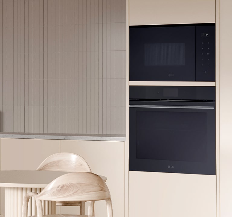 The Built- in microwave oven which is installed on the wall with the oven.