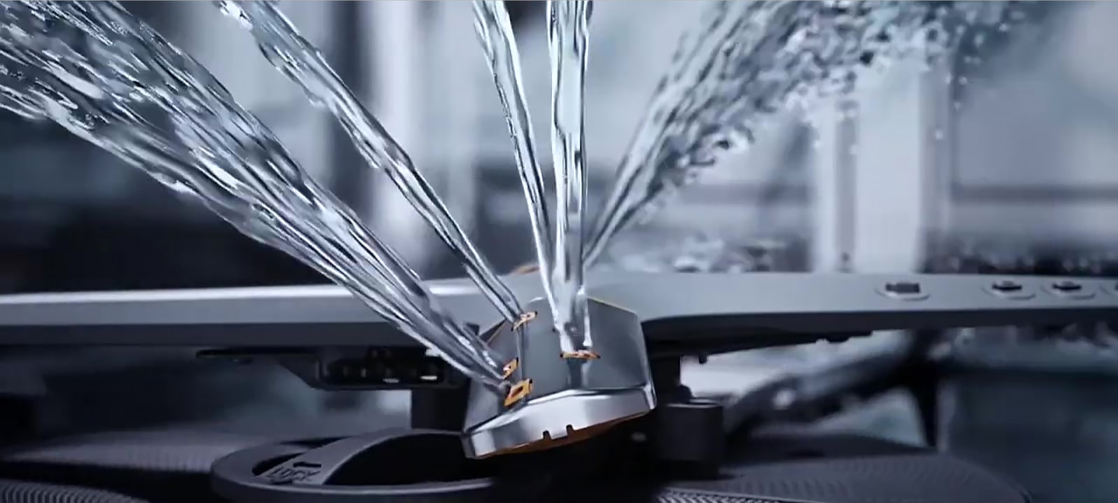 Showcasing how LG freestanding dishwasher quad wash technology works inside.