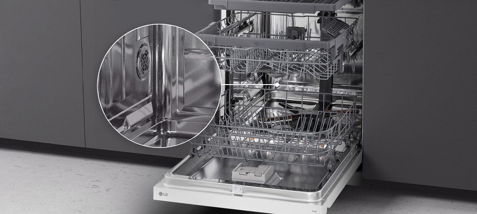 Open LG freestanding dishwasher in the kitchen, showcasing its fully stainless steel interior.