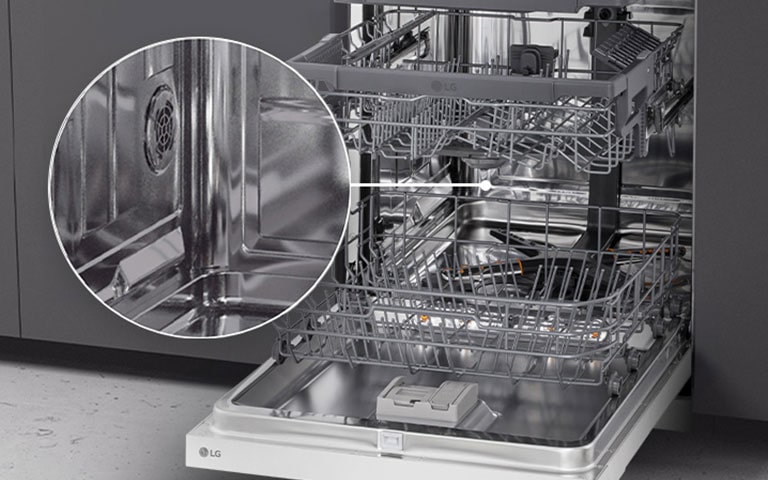 Open LG freestanding dishwasher in the kitchen, showcasing its fully stainless steel interior.