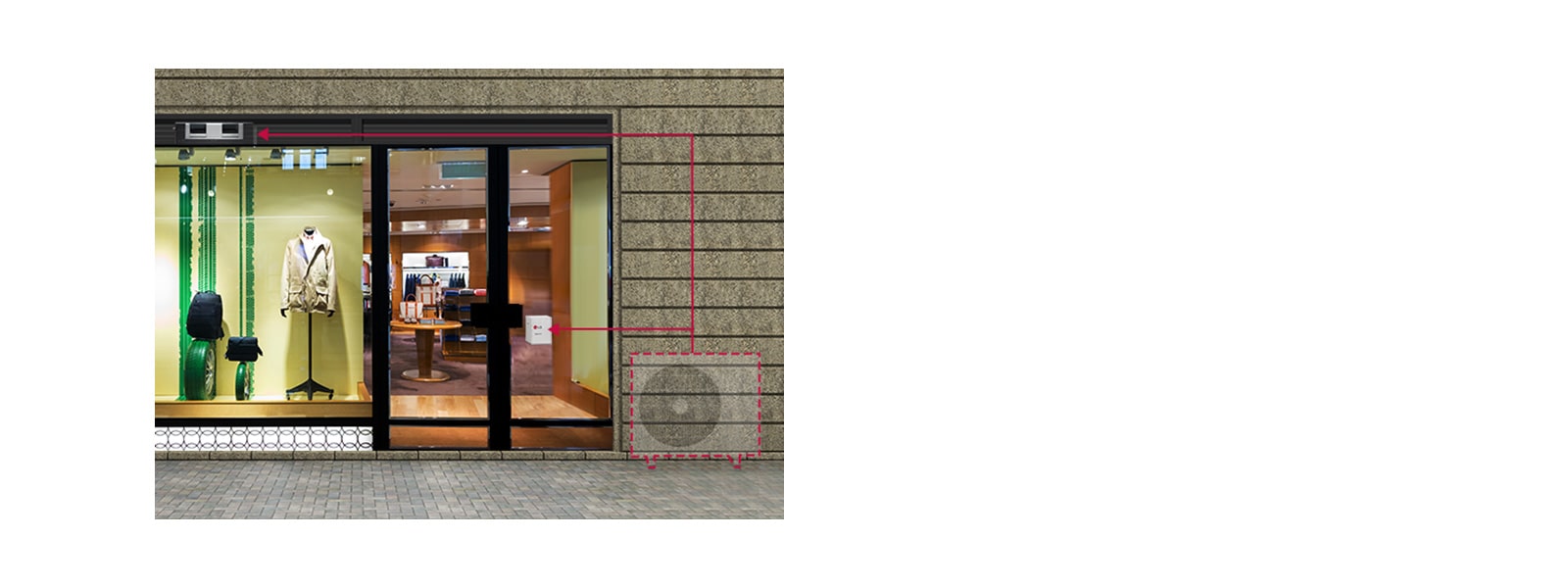 MUlTI V M mounted on the ceiling of a store with men's apparels displayed. Blurred image of an outdoor unit connected with an indoor unit in the store.