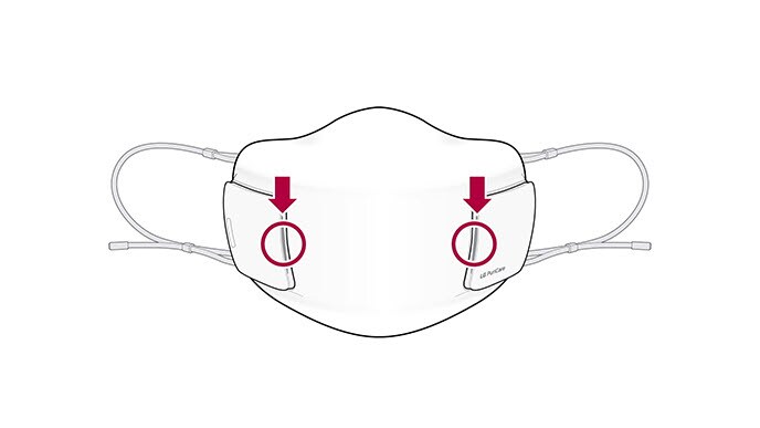 A video shows the front view of the mask with two circles on the filter. Two arrows appear and point down at the circles and then the arrows disappear and reappear and point from the side out. Then the filter opens out and then disappear and new filters are lying down. The mask disappears and the filters are still 