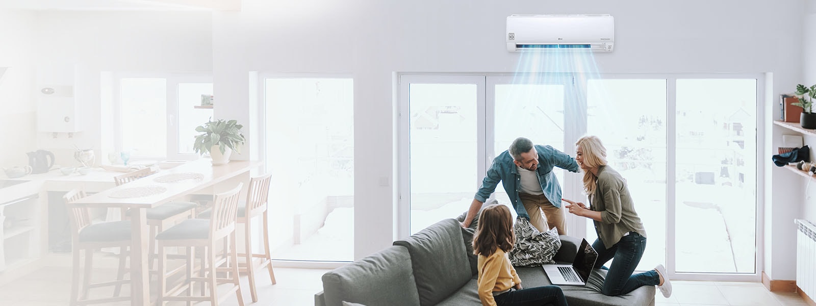 An image of a family having a good time in a living room.