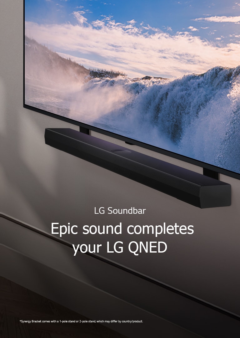 LG TV and Soundbar are placed within an angled perspective mounted on a wall. On the TV, a close up of a vast waterfall is displayed, and soft sunlight cascade over the wall, TV, and soundbar. A disclaimer reads: "Synergy Bracket comes with a 1-pole stand or 2-pole stand, which may differ by country/product."