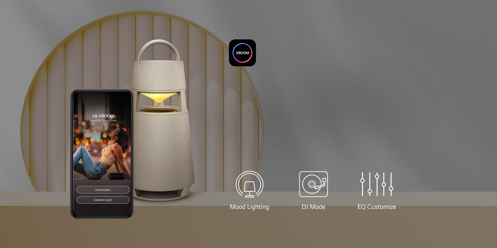 Mobile phone on xboom app screen and XBOOM 360 product on warm background.