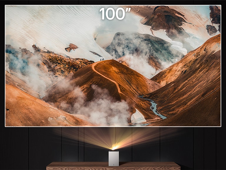 "LG CineBeam projecting a cloudy mountain image	"	
