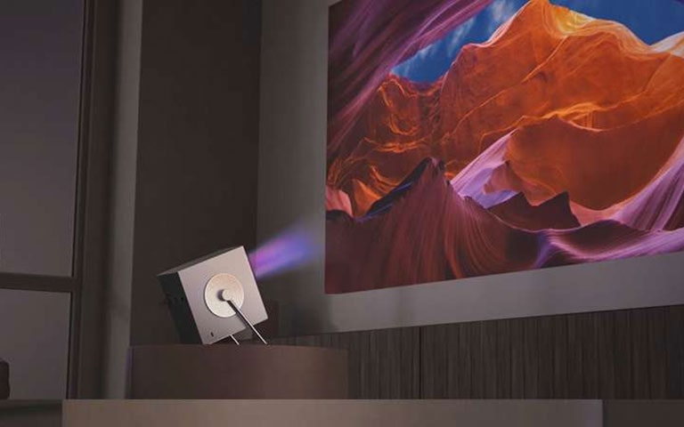 Video of LG CineBeam HU710PB - it projects on the wall of a 4k - 120-inches large screen.	