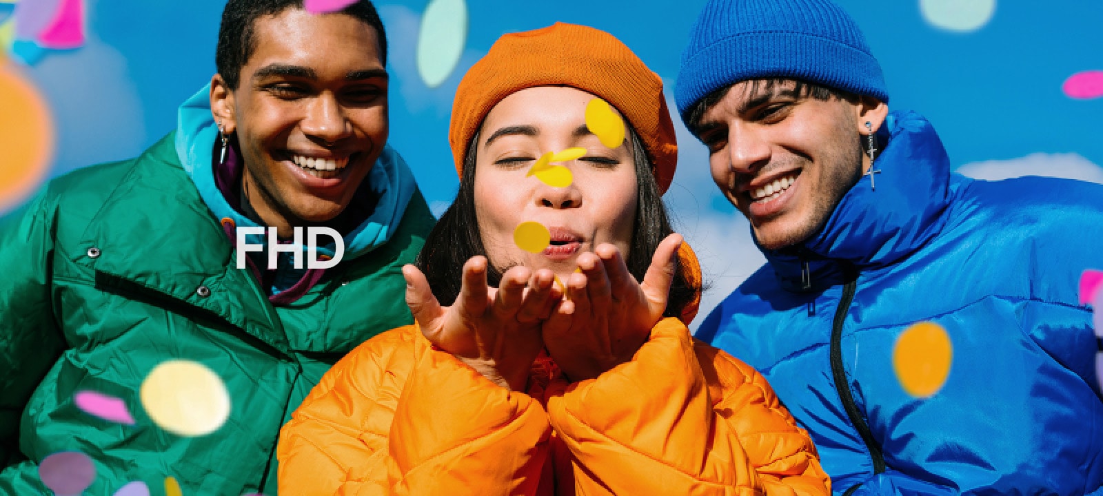 Three people wearing green, yellow, and blue outfits.