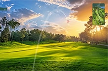 A virtual golf ball is in mid-flight with a stunning sunset on a green golf course and an overhead course map displayed.	
