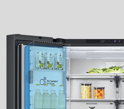 Inside the refrigerator, a slim indoor ice maker is highlighted in blue and the refrigerator is full of ingredients