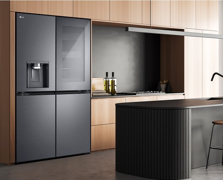 Modern kitchen interior with InstaView fridge.