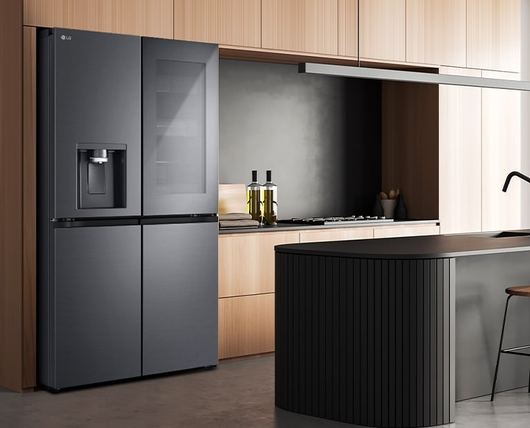 Modern kitchen interior with InstaView fridge.