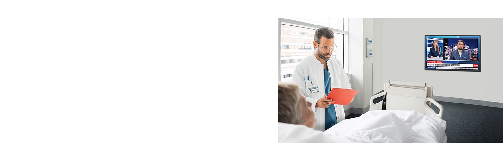 An LG commercial TV is installed in a hospital room.