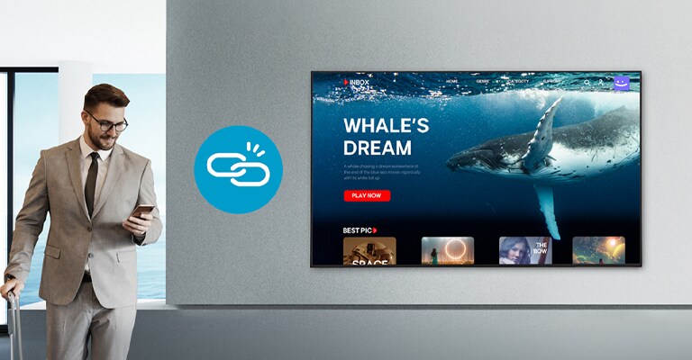 In this image, content is playing on the TV while a man looks at his phone. It is intended to demonstrate system synchronization.