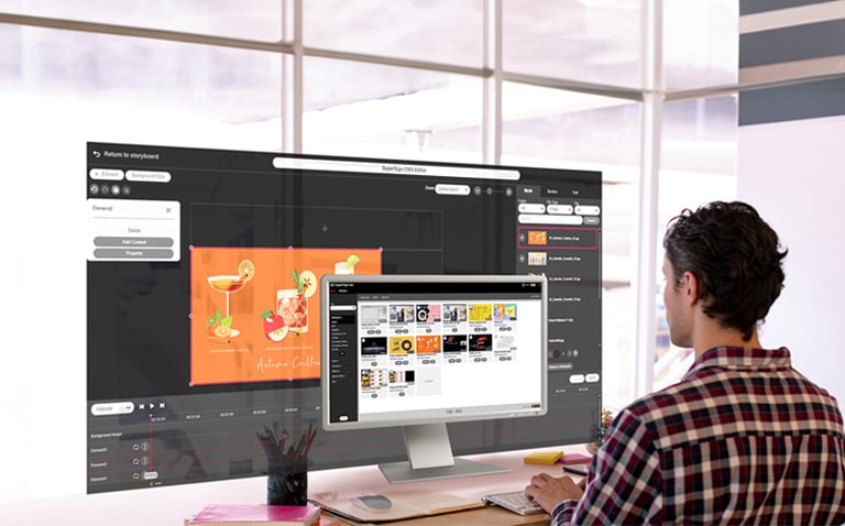 A man is creating content for the signage. The monitor screen displays a list of the generated content, while an editor for crafting content on a larger screen is also presented. Both screens provide genuine views accessible within the solution.