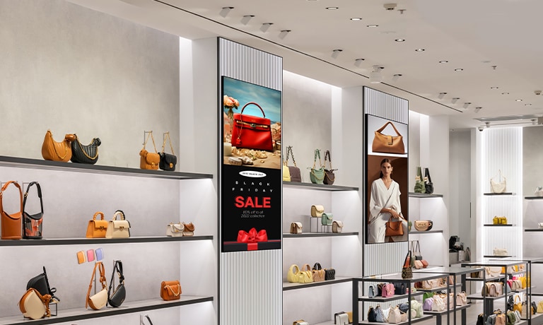 This image features several displays in a fashion retail store, each showing different content using PBP functionality.