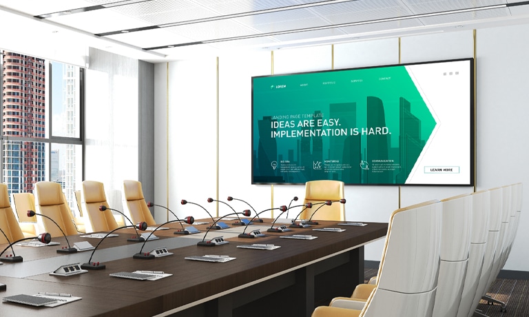 This image depicts a meeting room equipped with a display.