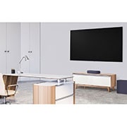 LG QP5 | 3.1.2ch | 320W | Dolby Atmos, A side view of a soundbar and a subwoofer placed in a white office, QP5, thumbnail 6