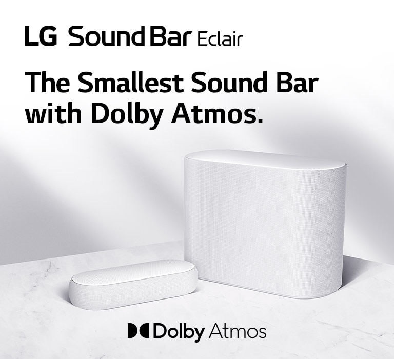 A soundbar and a subwoofer are placed on a marble floor, soundbar and subwoofer facing opposite sides