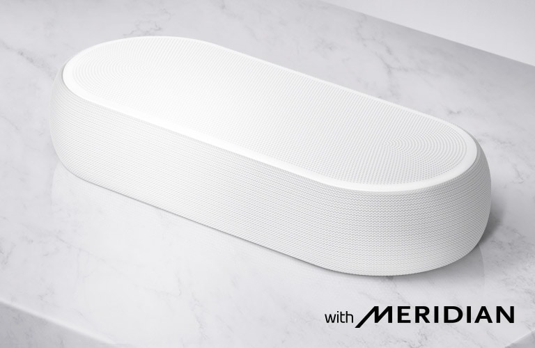 Close-up LG Soundbar right side with LG logo on the bottom right corner of a product.