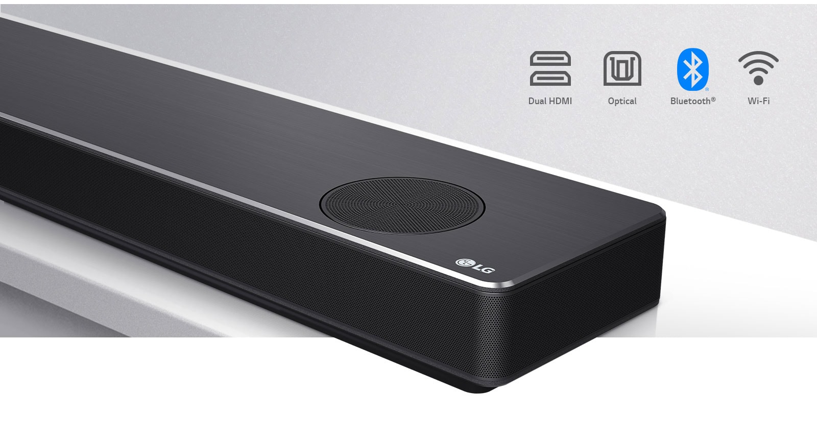 Close-up LG Soundbar right side with LG logo on the bottom right corner. Connectivity icons shown above the product. 