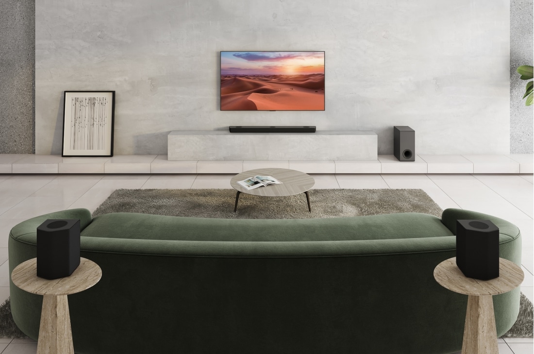 LG Soundbar S95QR | 9.1.5ch | 810W | Dolby Atmos, A subwoofer, a sound bar, and TV are in a white living room, S95QR, thumbnail 5