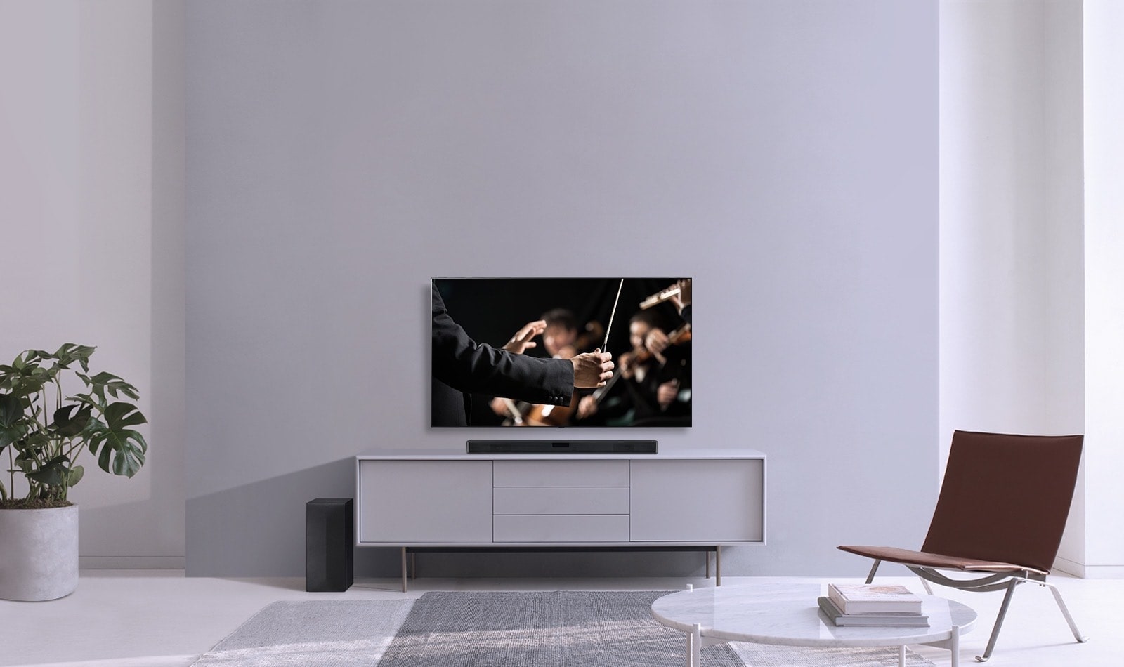 Image of a living room with home theatre set up