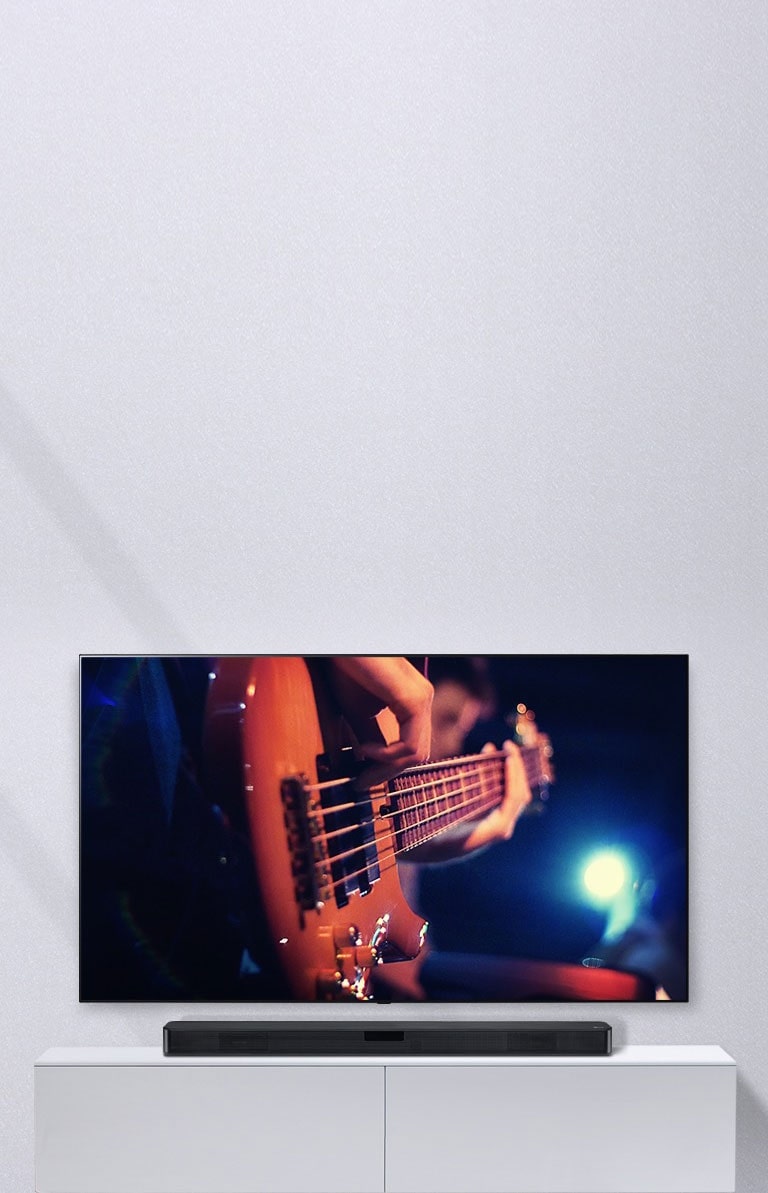 Image of a TV and sound bar set up