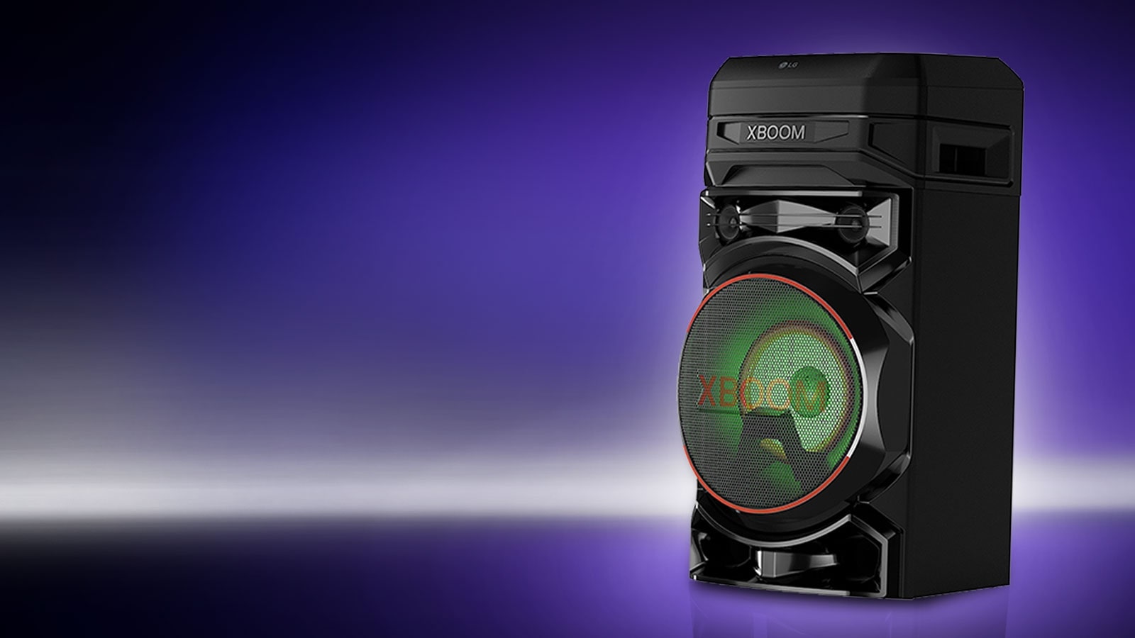 A low angle view of the right side of LG XBOOM against a purple background. The XBOOM lights are red.