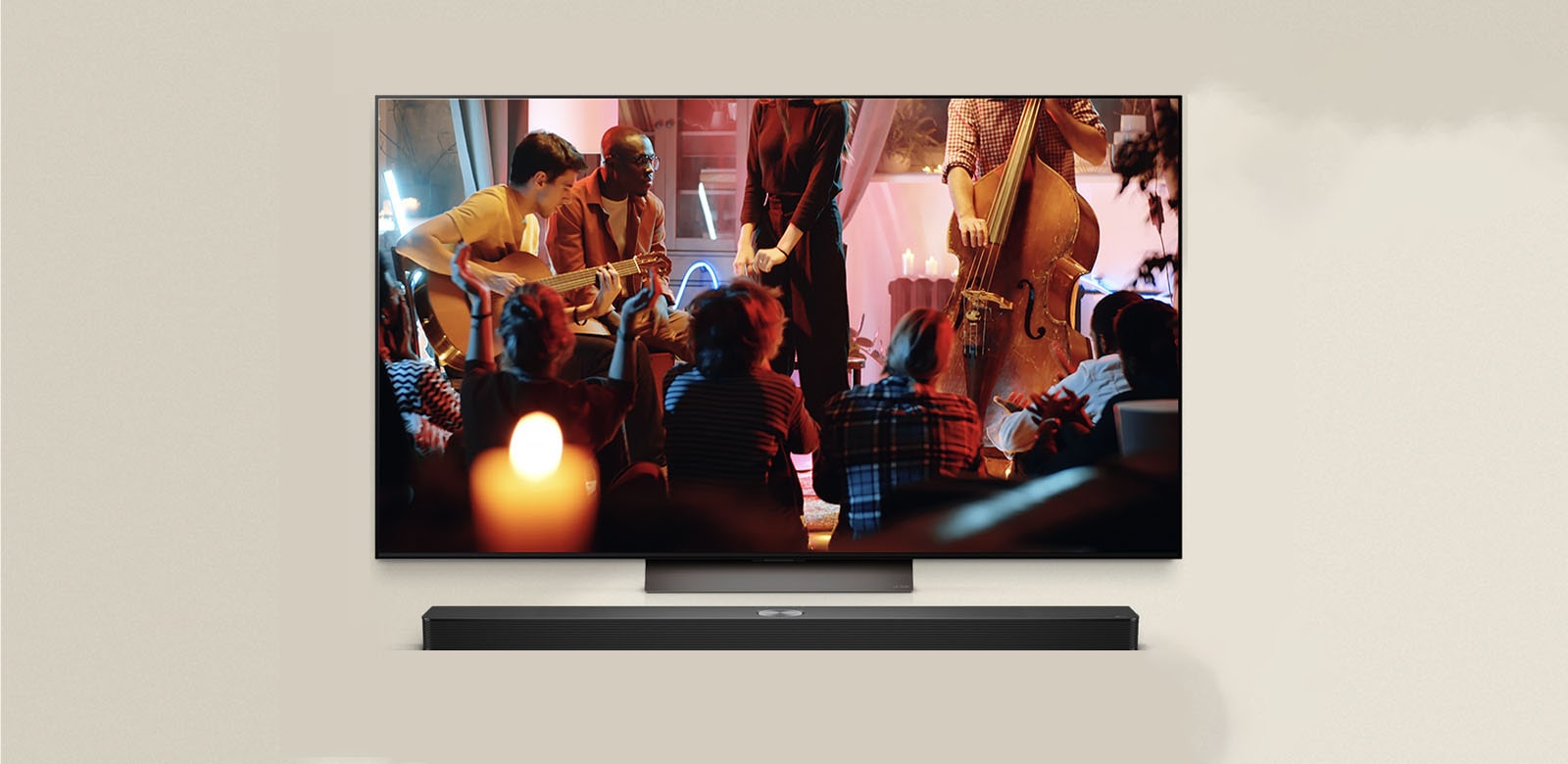 A cozy concert in a living room is playing on the screen. The WOW Interface menu appears as an overlay and the user navigates to soundbar settings.