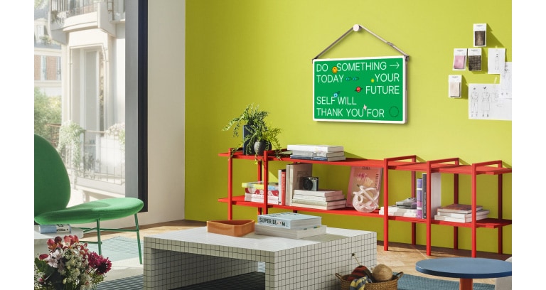 Living spaces with LG StanbyME 2 screens on the wall. Art Poster content are on the screens.