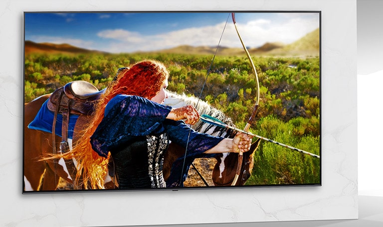 TV screen showing the scene of SF movie with a woman shooting a bow