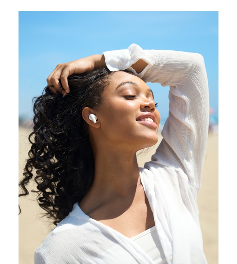 A person is lying in bed sleeping peacefully while wearing T90 earbuds.