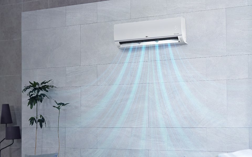 A wall-mounted LG Dual Inverter air conditioner dispersing cool air into a modern, tiled room.