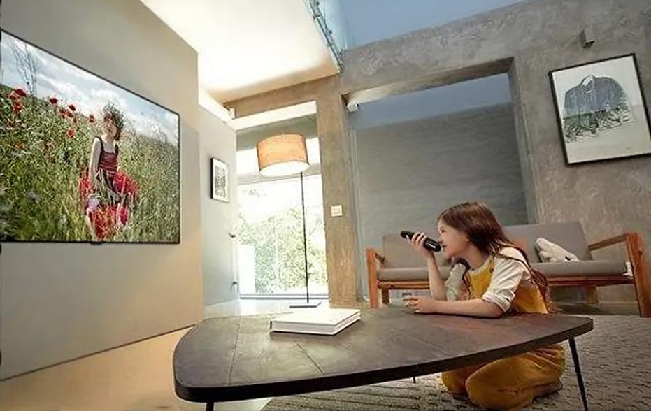 a girl using LG smart appliances at home