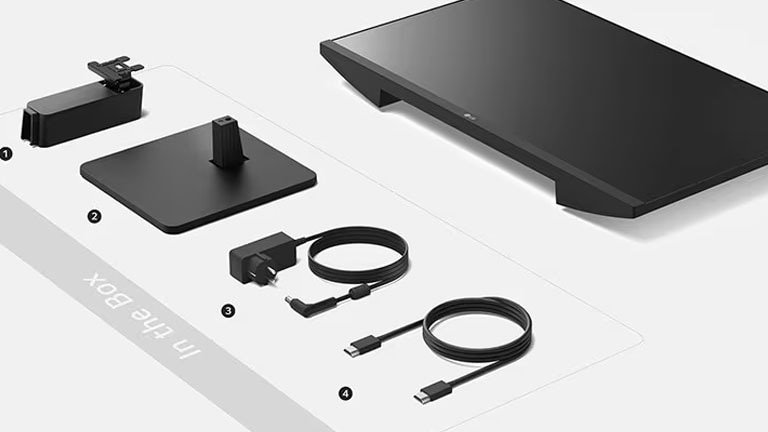 جسم الحامل وقاعدة الحامل والمحول + كابل الطاقة وكابل HDMI في الصندوق.