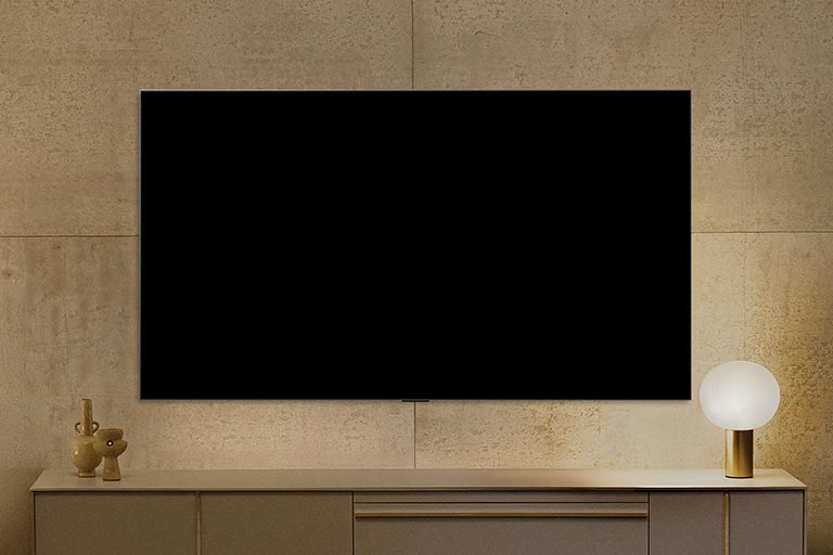 LG QNED AI QNED70 Mini LED looks powered down on the wall, then Gallery Mode turns on, shows information, and cycles through different artworks. 