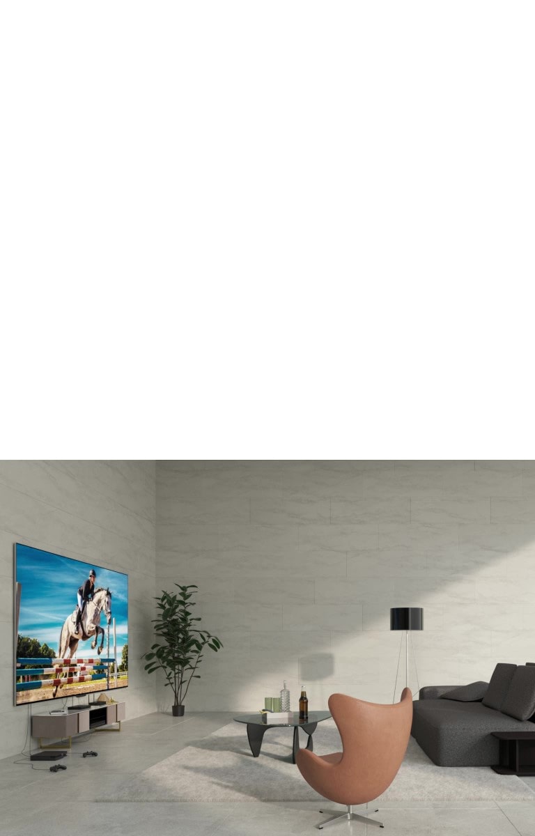 جهاز LG OLED evo M4 مثبت على حائط، وأجهزة متصلة بالتلفزيون بأسلاك فوضوية في الأسفل. يمر خط رسومي أبيض عبر الصورة، وتتلاشى الأجهزة ويظهر صندوق Zero Conenct Box على طاولة صغيرة. تُعتم الصورة لفترة وجيزة ويُسلَّط الضوء على صندوق Zero Connect Box والتلفزيون. يتلاشى كل شيء، ثم يظهر التلفزيون وصندوق Zero Connect Box مرة أخرى مظللًا في مواقع مختلفة. تضيء الصورة من جديد.