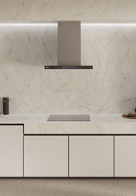 This is an image of the kitchen interior with an LG built-in oven, hood, and Induction hob installed.