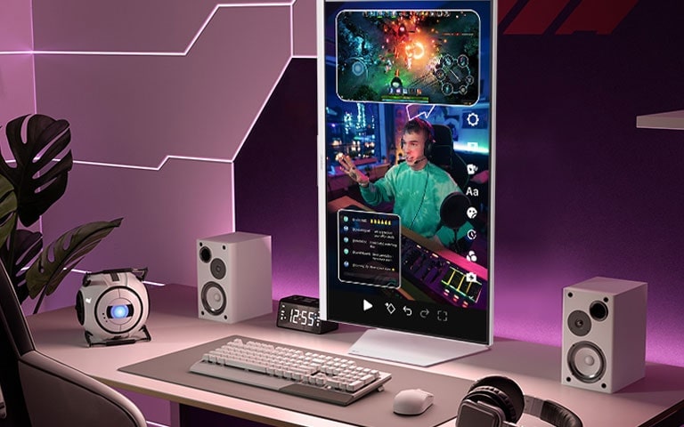 A 90-degree pivoted monitor showing streamers playing games.