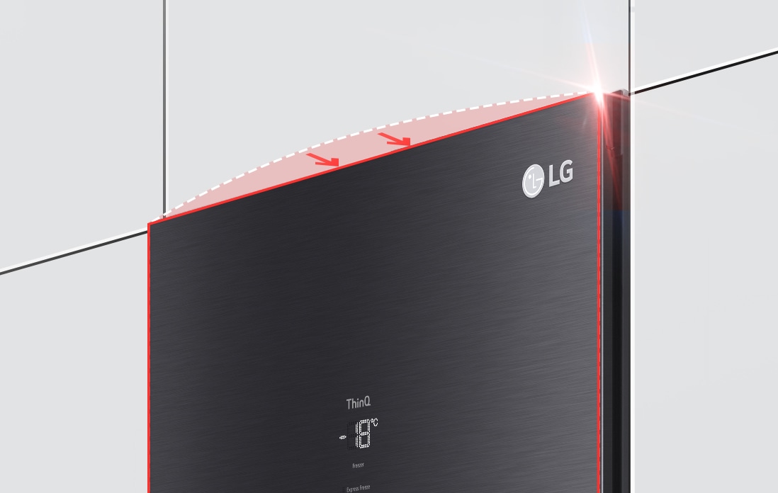 The top of the freezer is shown at an angle with two arrows pointing in toward the wall to indicate it is flush with the cabinets surrounding it.