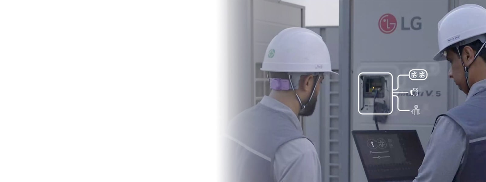 Technicians using a laptop to service LG MULTI V HVAC equipment, showing smart diagnostic interface during maintenance work.